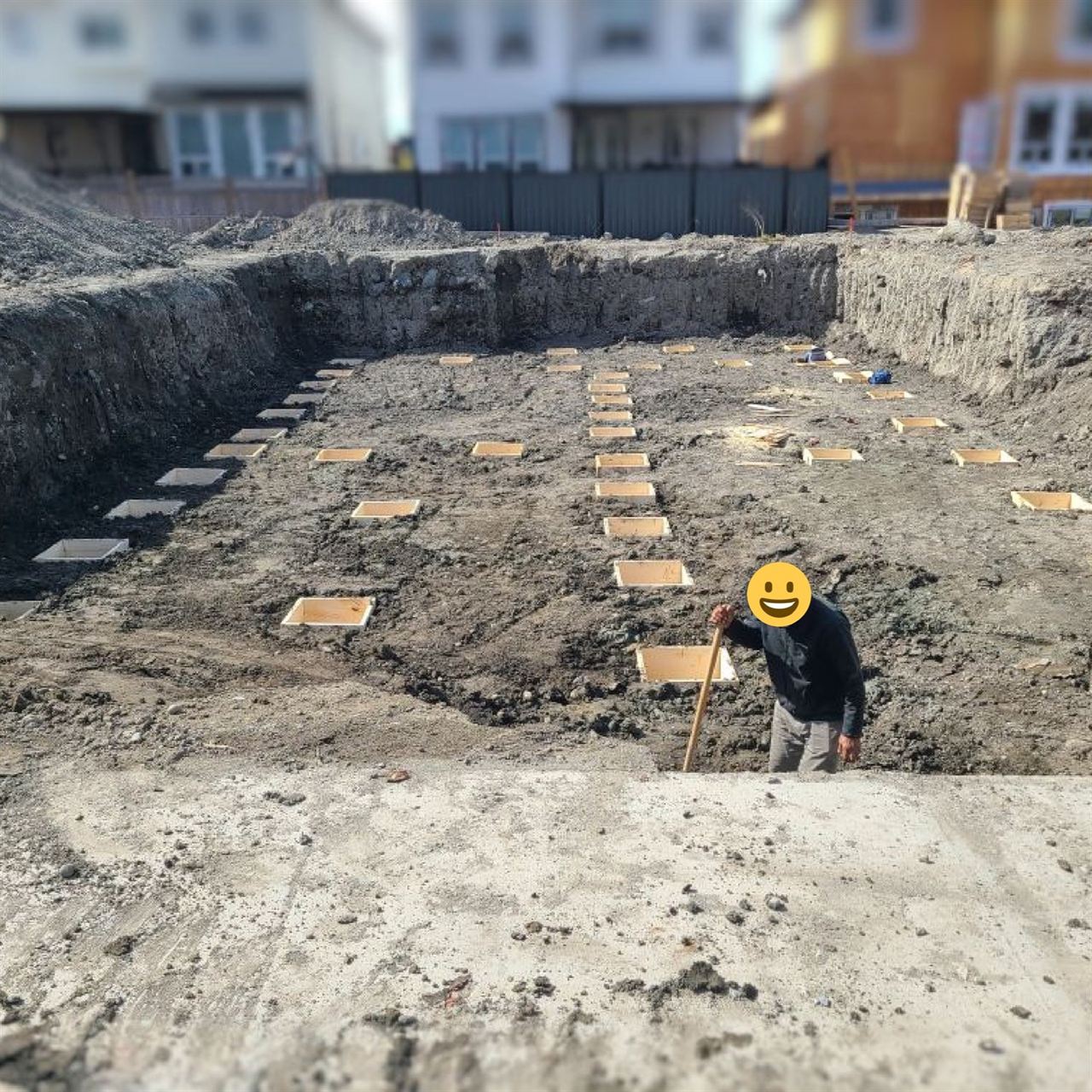 Excavated foundation with footing pad formwork laid out in a grid