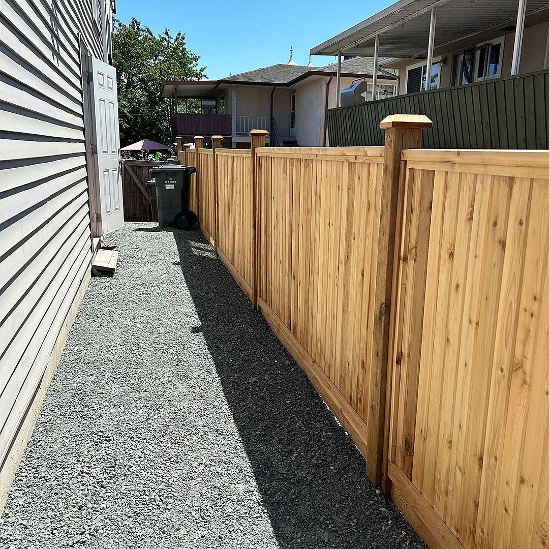 New cedar privacy fence with clean horizontal and vertical boards
