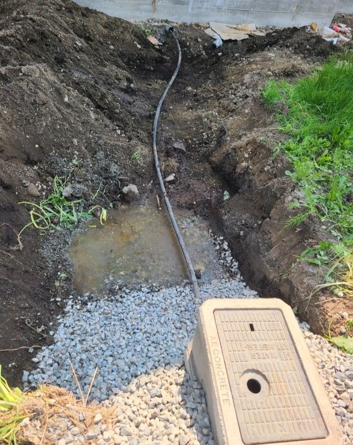 Water line install with utility box and gravel bedding