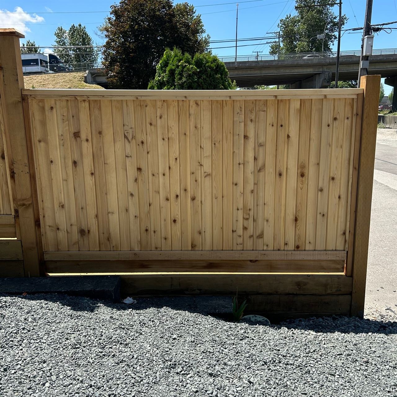Cedar privacy fence panel near a roadway